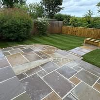 Completed garden transformation Suffolk — Finished garden transformation with patio, turf, and fencing installed