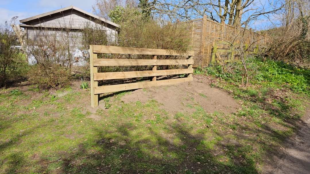 Decking installation Suffolk — Wooden decking fence or gate structure in rural garden setting