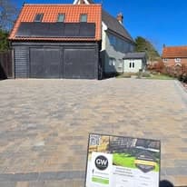 Driveway installation Suffolk — Block paved driveway with house and garage visible