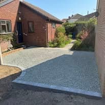 Driveway installation Suffolk — Gravel or resin bound driveway with clean, finished appearance