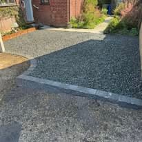 Driveway installation Suffolk — Resin bound aggregate driveway with metal edge restraint installed