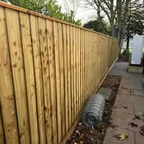 Fencing & gates Suffolk — Wooden fence panel is the main subject of the photograph