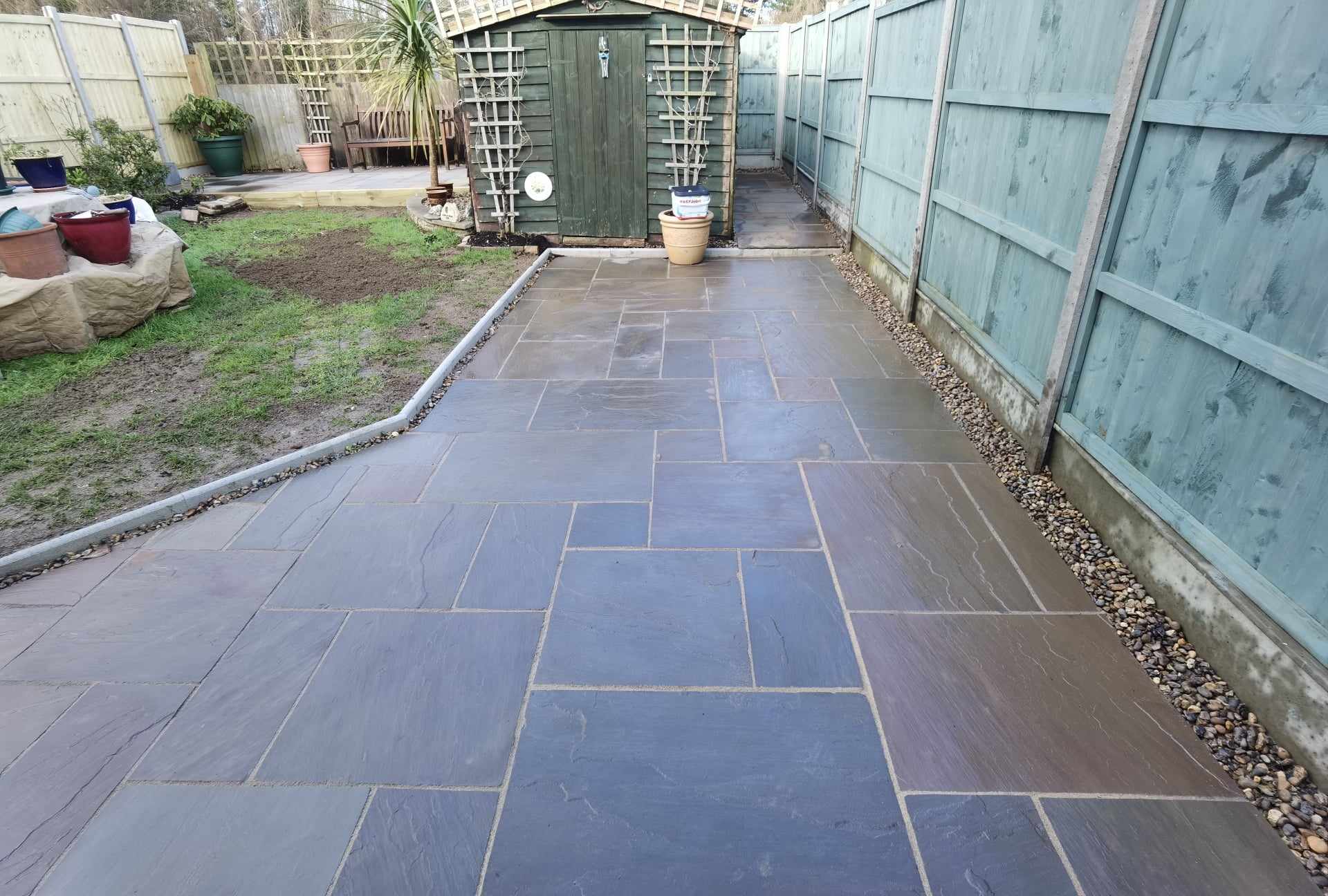 Patio installation Suffolk — Newly laid Indian sandstone patio with mixed slab sizes and pattern