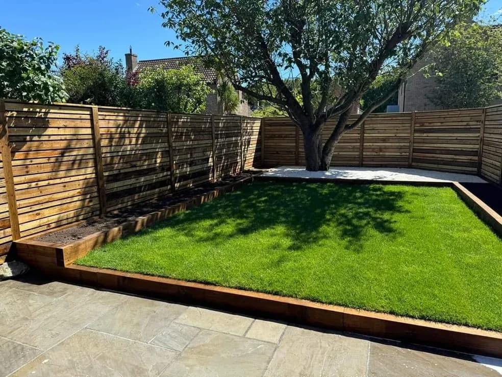 Garden Worx Suffolk — landscaped garden with patio, artificial lawn and fencing